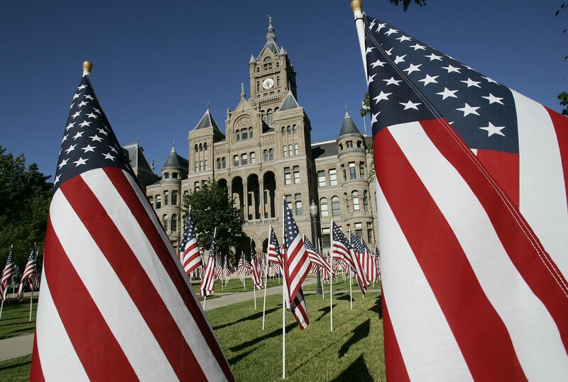 FILE - Numerous flags blow in the breeze at the City County Building July 15, 2005 for Child Abuse Prevention. Former state Sen. Jim Dabakis — a likely frontrunner according to recent polls — is the candidate with the most cash-on-hand, having only spent