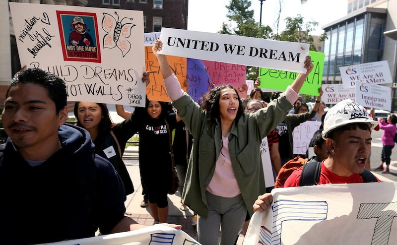 Supporters of DACA march at the Utah State Capitol in Salt Lake City.
