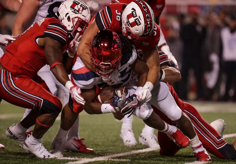 Utah Utes linebacker Francis Bernard (36) tackles Arizona Wildcats running back Gary Brightwell (23) during the game at Rice-Eccles Stadium in Salt Lake City on Friday, Oct. 12, 2018.
