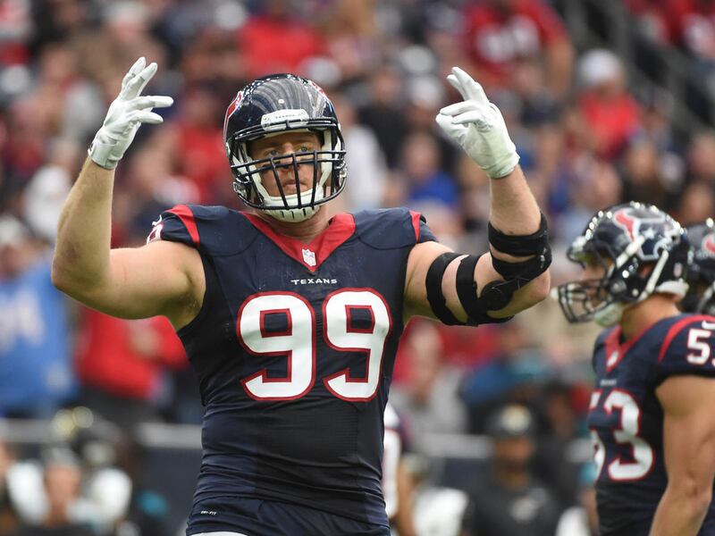 FILE - In this Jan. 3, 2016, file photo, Houston Texans defensive end J.J. Watt (99) gestures during the first half of an NFL football game against the Jacksonville Jaguars, in Houston.