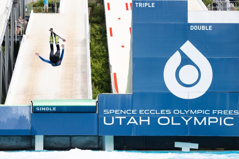 A participant jumps off a ski ramp at the Utah Olympic Park in Park City on Friday, June 23, 2023.