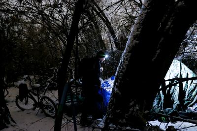 Shawn Spalding, an outreach worker for Volunteers of America - Utah, finds an empty encampment while doing the annual Point-in-Time count in South Salt Lake on Thursday, Jan. 24, 2019.