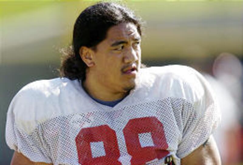 Utah defensive lineman Kelly Talavou was held out of Saturday's spring game because coaches didn't want to risk an injury.