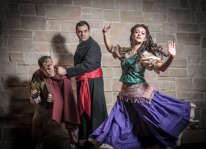 James Bounous as Quasimodo, left, Josh Richardson as Claude Frollo and Rebecca Burroughs as Esmeralda in the Monday/Wednesday/Friday cast of Hale Centre Theatre's "The Hunchback of Notre Dame," which will run Feb. 5-March 31.