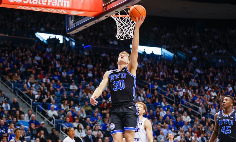 BYU Cougars guard Dallin Hall goes for a layup while playing the Weber State Wildcats in Provo on Thursday, Dec. 22, 2022. BYU won 63-57.