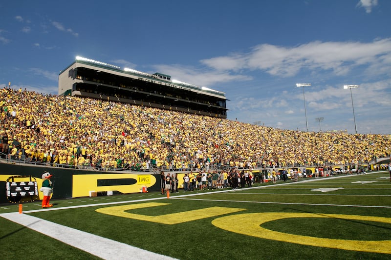 Oregon fans are shown at Autzen Stadium during the first half of their NCAA college football game against Fresno State in Eugene, Ore., Saturday, Sept. 8, 2012.