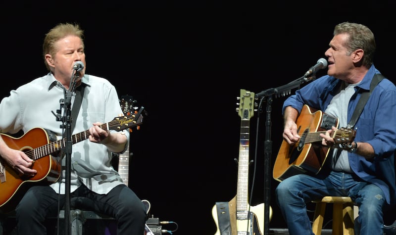 Don Henley, left, and Glenn Frey of The Eagles perform on the “History of the Eagles” tour at the Forum, in Los Angeles.