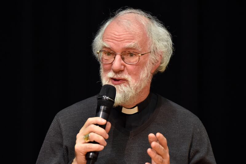 Lord Rowan Williams, the former archbishop of Canterbury and now a member of the House of Lords and master of Magdalene College at Cambridge, answers a question as part of a distinguished panel of religious leaders discussing "Inspiring Service" in Pembro