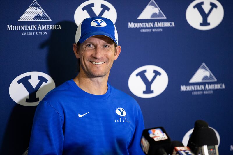 Aaron Roderick, wearing a blue shirt, smiles.