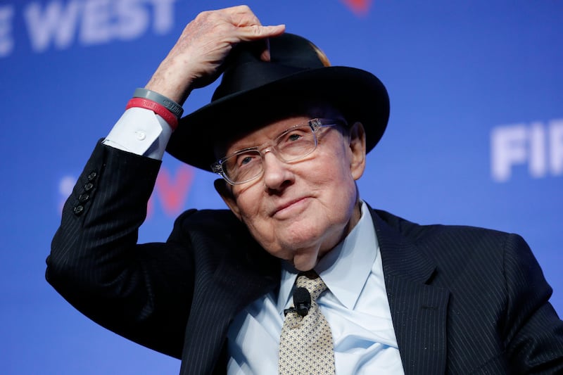 Former U.S. Sen. Harry Reid tips his hat during a fundraiser for the Nevada Democratic Party, Sunday, Nov. 17, 2019, in Las Vegas.
