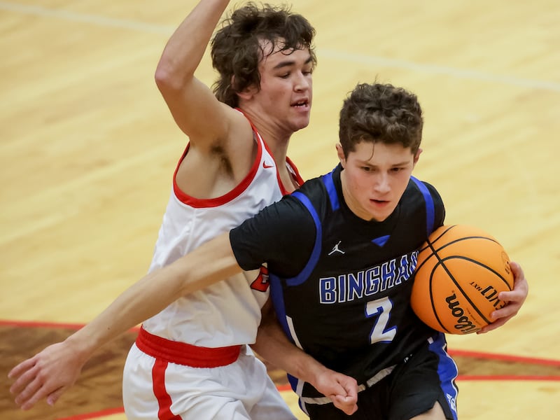 American Fork and Bingham face off in a high school boys basketball game in American Fork.