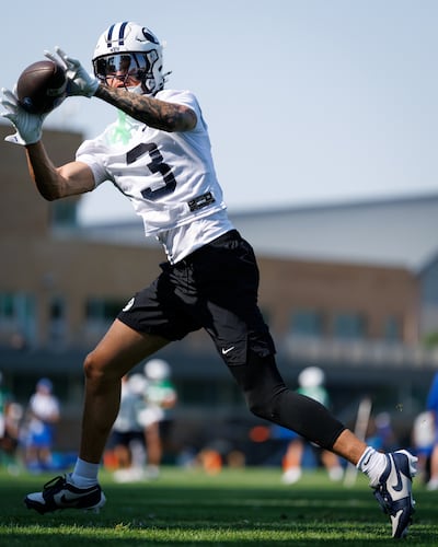 BYU receiver Kyler Kasper catches a pass during the first day of fall camp Wednesday, Aug. 5, 2026, in Provo.