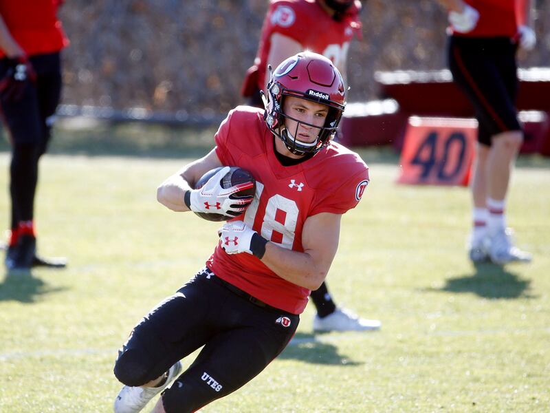 Utah Utes wide receiver Britain Covey (18) practices at the Spence and Cleone Eccles Football Center