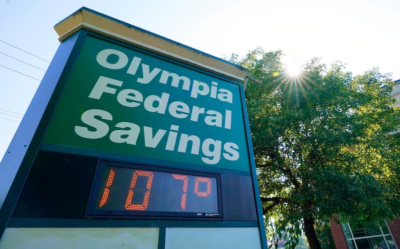A display at an Olympia Federal Savings branch in Washington state shows a temperature of 107 degrees Fahrenheit.