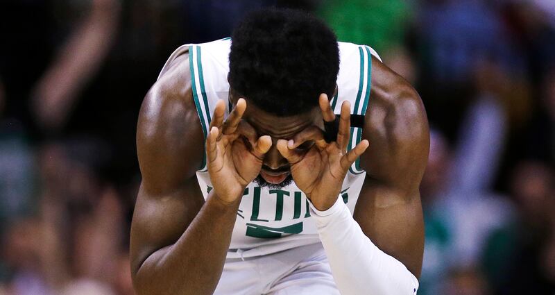 Boston Celtics guard Jaylen Brown reacts after hitting a 3-pointer against the Philadelphia 76ers during the third quarter of Game 5 of an NBA basketball playoff series in Boston, Wednesday, May 9, 2018. (AP Photo/Charles Krupa)