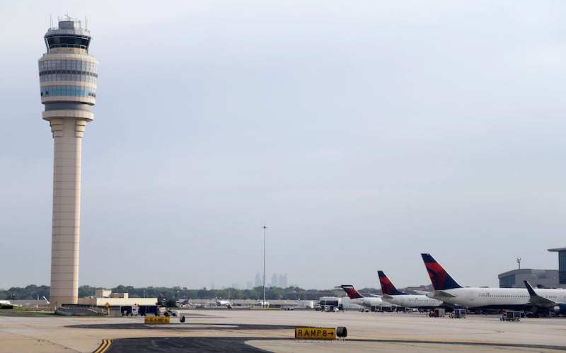 Aircraft sit at their gates at Hartsfield–Jackson Atlanta International Airport, in Atlanta.