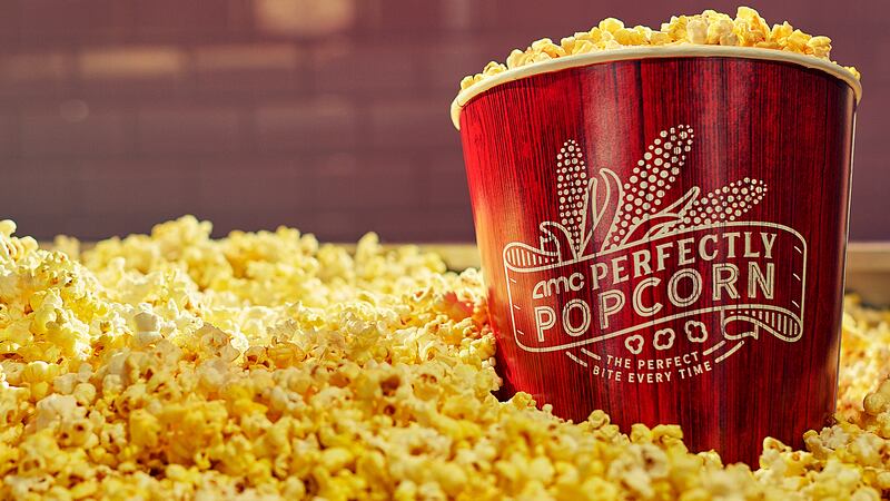A bucket of movie theater popcorn.