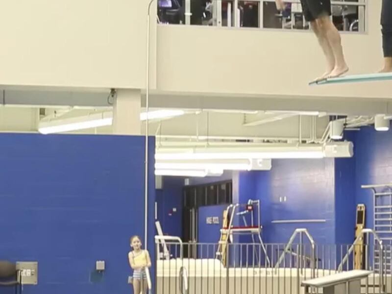 Rochester Institute of Technology diving coach and a Mormon, Cliff Devries, makes his annual birthday dive.