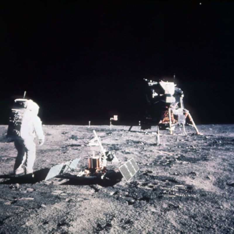 Astronaut Edwin E. Aldrin Jr., the lunar module pilot, stands on the lunar surface after the Apollo 11 moon landing on July 20, 1969. The module is seen in the background. The first landing of a human being on the moon on July 20, 1969, will celebrate its