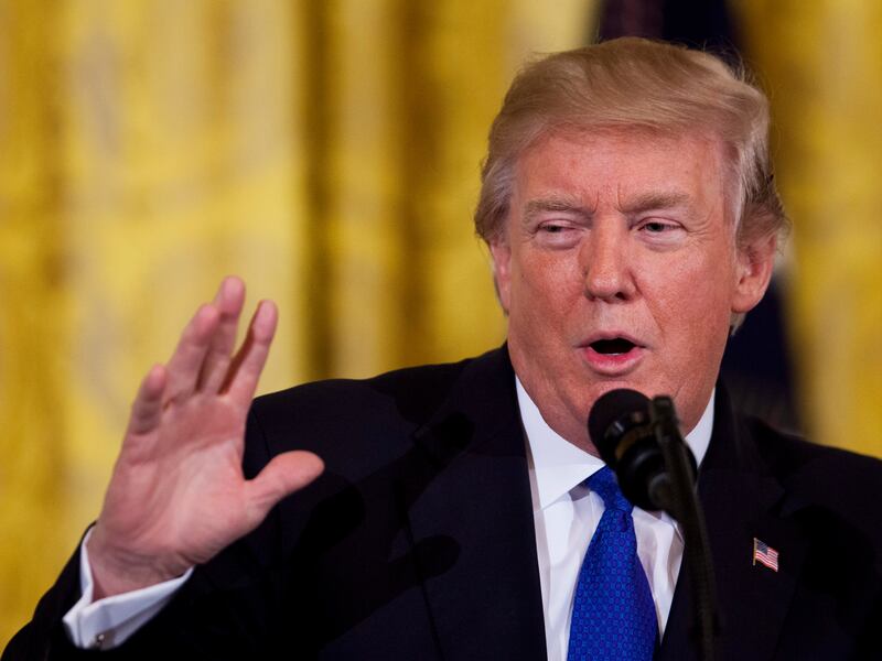 President Donald Trump speaks to a gathering of mayors in the East Room of the White House in Washington, Wednesday, Jan. 24, 2018.