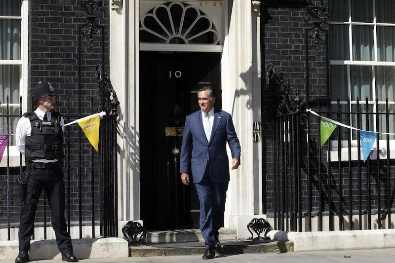 Republican presidential candidate, former Massachusetts Gov. Mitt Romney walks out of 10 Downing Street after meeting with British Prime Minister David Cameron in London, Thursday, July 26, 2012.