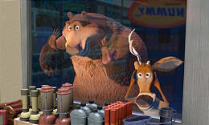 Boog, left, (voiced by Martin Lawrence) and Elliot (Ashton Kutcher) are a wild pair in “Open Season.”