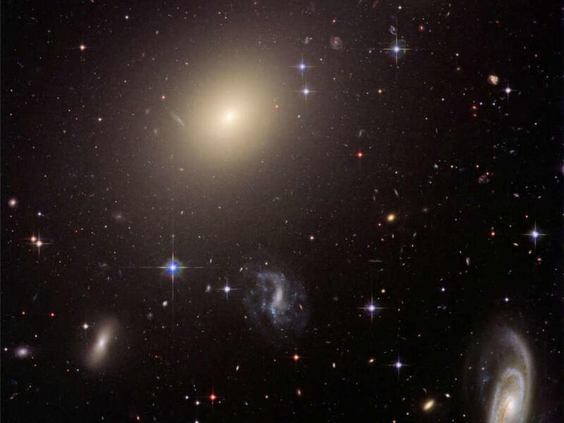 This photo provided by NASA, taken in 2006 by the Hubble Space Telescope shows a cluster of diverse galaxies.