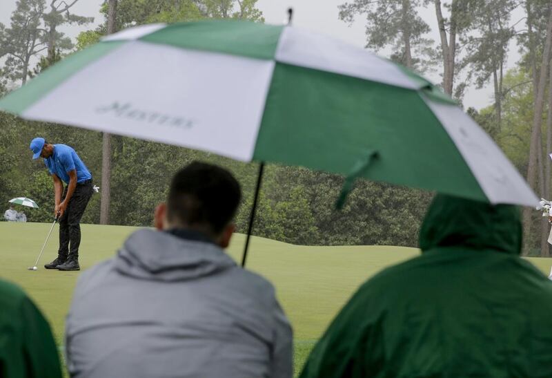 Tony Finau putts on the 14th hole during the third round at the Masters golf tournament Saturday, April 7, 2018, in Augusta, Ga. (AP Photo/David Goldman)