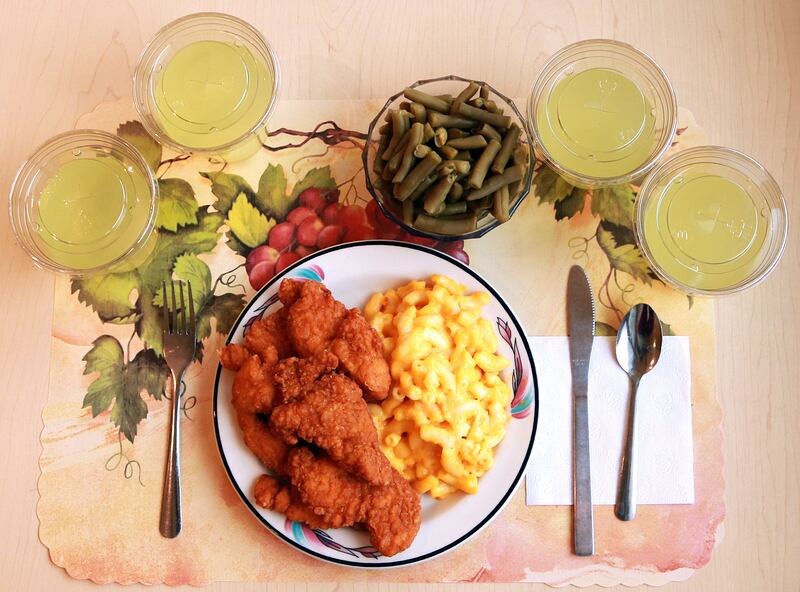 An “ultraprocessed” lunch including brand name macaroni and cheese, chicken tenders, canned green beans and diet lemonade.