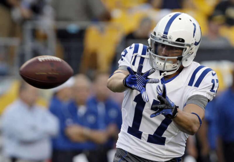 Indianapolis Colts wide receiver Austin Collie (17) warms up before an NFL preseason football game against the Pittsburgh Steelers in Pittsburgh, Sunday, Aug. 19, 2012. (AP Photo/Mark Duncan)