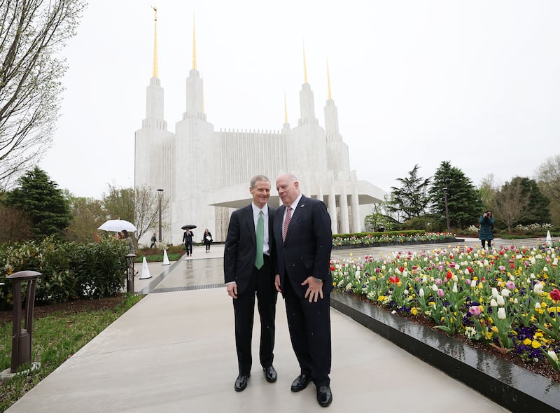 Elder David A. Bednar, left, laughs with Maryland Gov. Larry Hogan after a tour of the Washington D.C. Temple.