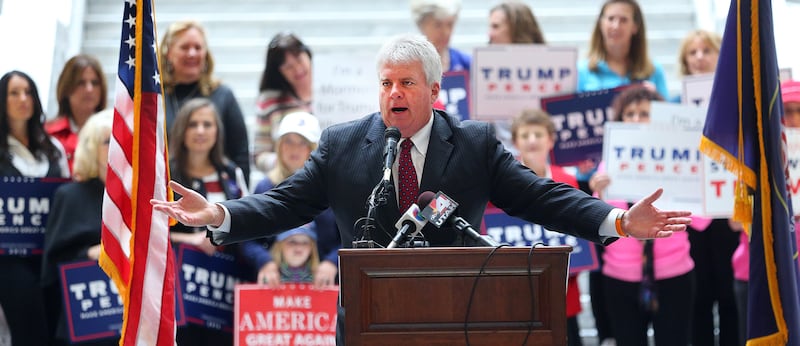 Don Peay, head of Utahns for Trump, speaks during a rally for GOP presidential candidate Donald Trump at the Capitol rotunda in Salt Lake City.