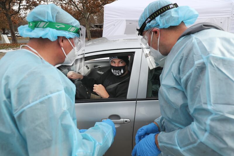 Jon O’Brien gets a COVID-19 test at a Utah National Guard Joint Task Force 97 mobile testing site in Salt Lake City.