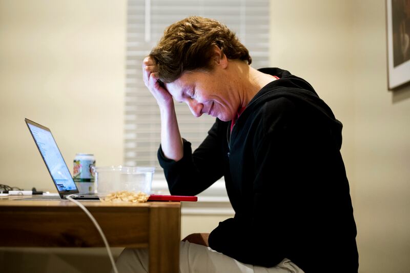 Stanford professor Carolyn Bertozzi pauses during a phone call shortly after learning she was awarded the Nobel Prize.