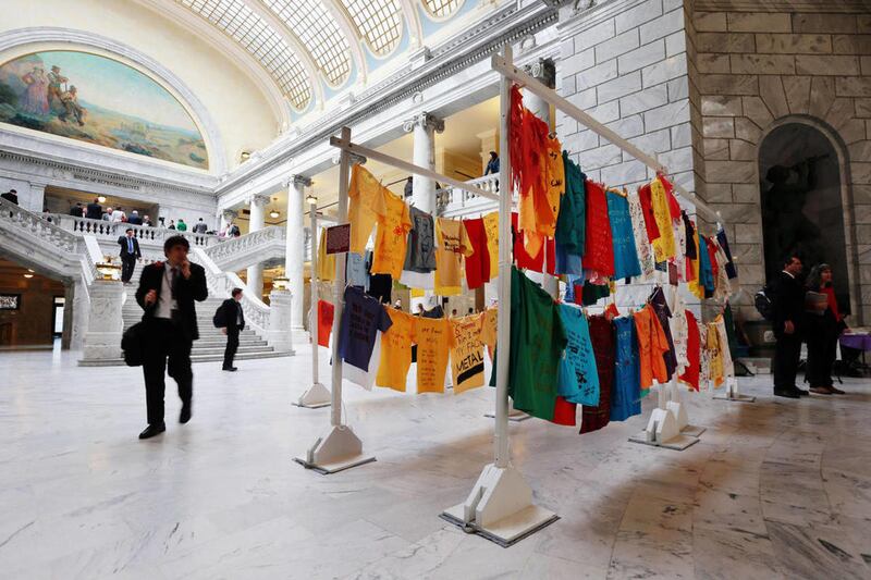 File - The Utah Coalition Against Sexual Assault and the Salt Lake Area Domestic Violence Coalition co-sponsor a public exhibit Monday, Feb. 2, 2015, of the Clothesline Project in the state Capitol rotunda in Salt Lake City.