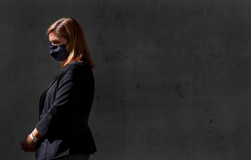 Salt Lake County Mayor Jenny Wilson wears a mask as Gary Edwards, health department executive director, discusses the county’s phased reopening plan during a press conference at the county’s Emergency Management Emergency Coordination Center in South Salt Lake on Wednesday, April 29, 2020.