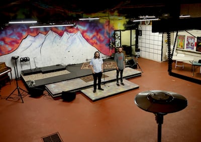 Ford Harris and Kade Long stand in the music venue at Bill Harris Music in Provo on Friday, June 14, 2019.