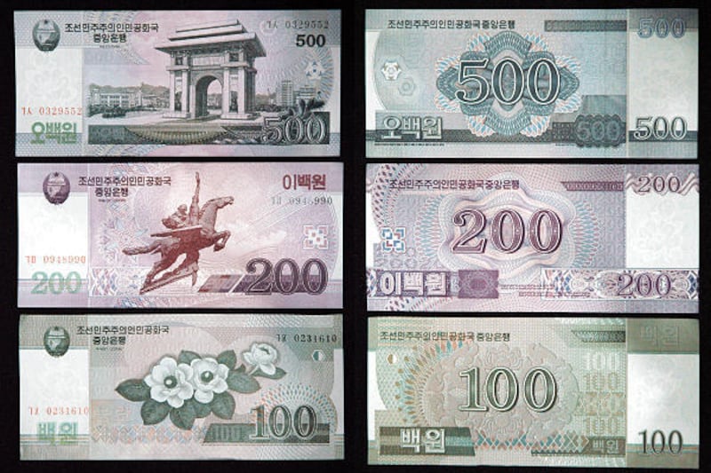 In this undate photo released from North Korea's Chosun Shinbo via Yonhap, the front and back designs of North Korea's new paper currency after its recent reform are shown.