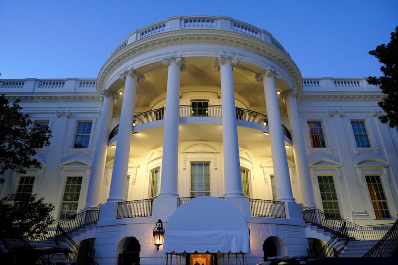 Lights shine on the Truman Balcony of the White House in Washington, Saturday, March 6, 2021.