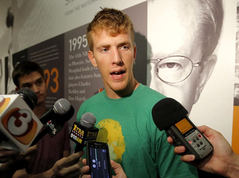 Phoenix Suns draft prospect E.J. Singler, of Oregon, speaks with the media, Wednesday, June 5, 2013, in Phoenix. (AP Photo/Matt York)