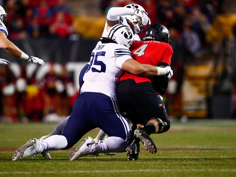 Khyiris Tonga makes tackle during game against UNLV on Friday, Nov. 10, 2017, in Las Vegas.