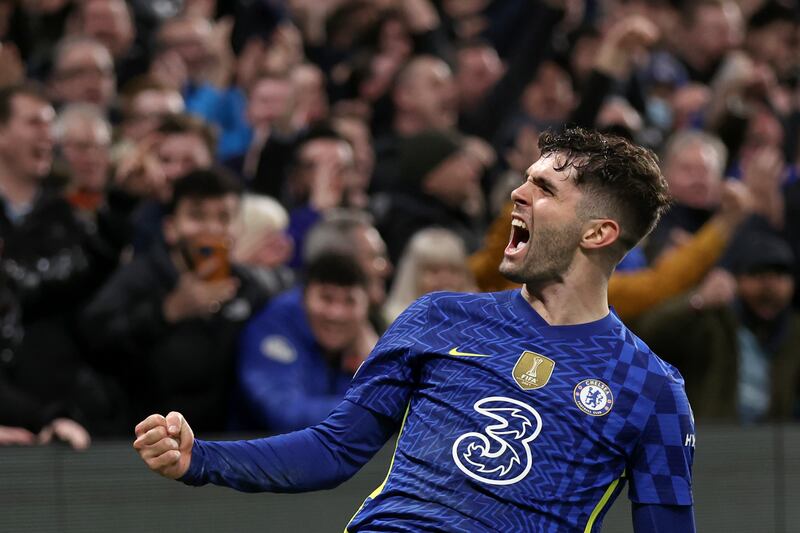 Chelsea’s Christian Pulisic celebrates after scoring his side’s second goal during the Champions League round of 16, first leg, soccer match between Chelsea and LOSC Lille at Stamford Bridge stadium in London.
