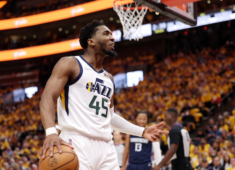 Utah Jazz guard Donovan Mitchell (45) gets the crowd worked up after a play as the Utah Jazz and the Dallas Mavericks play Game 4 of their NBA playoff series at Vivint Arena in Salt Lake City on Saturday, April 23, 2022. Utah won 100-99.