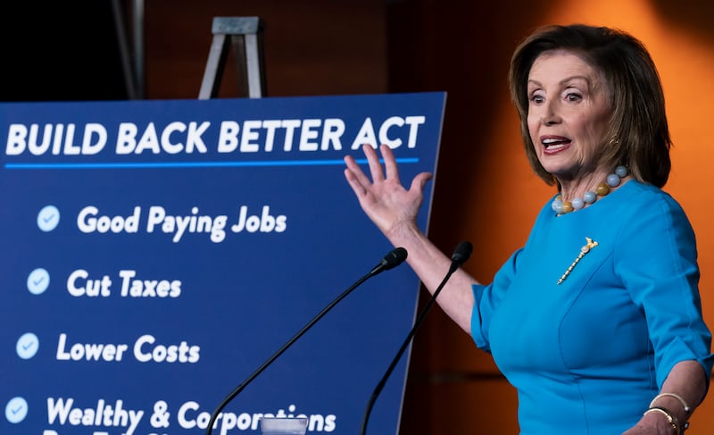 Speaker of the House Nancy Pelosi, D-Calif., talks to reporters about plans to pass President Joe Biden’s domestic agenda.