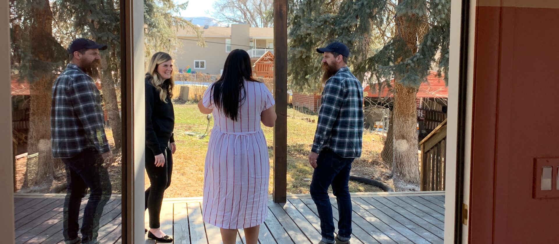 Designer Candis Meredith, homeowner Aubrey Bennion and Andy Meredith at Bennion’s home in Bountiful.