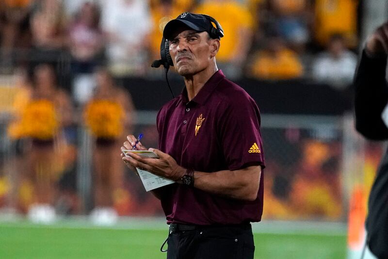 Arizona State coach Herm Edwards looks toward the scoreboard with his team his down against Eastern Michigan during the first half of an NCAA college football game Saturday, Sept. 17, 2022, in Tempe, Ariz. (AP Photo/Darryl Webb)