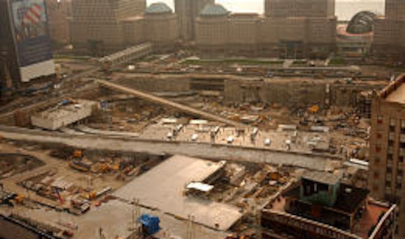 It's dusk at ground zero. Workers finish their shifts as security guards for the night shift arrive. This week, more human remains were found.