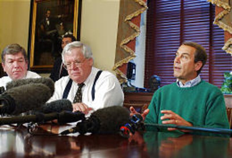 GOP Whip Roy Blunt, R-Mo., left, and House Speaker Dennis Hastert, R-Ill., listen as House Republican Majority Leader John Boehner, R-Ohio, right, speaks.