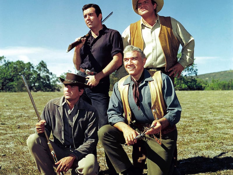 Pernell Roberts as Adam Cartwright, back left, Dan Blocker as Hoss Cartwright, Michael Landon, front left, as Little Joe Cartwright and Lorne Green as Ben Cartwright.