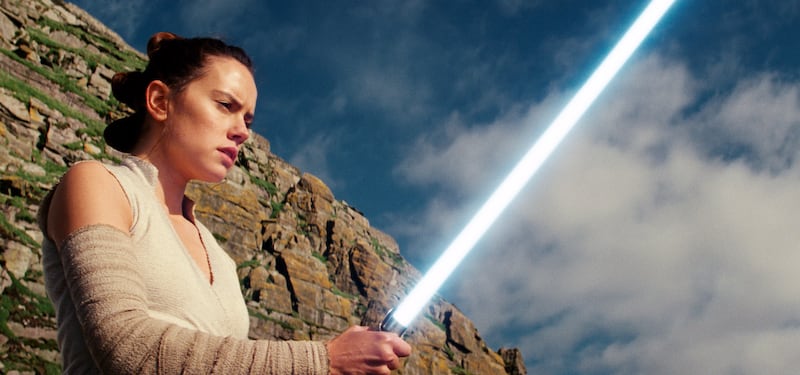 This image released by Lucasfilm shows Daisy Ridley as Rey in "Star Wars: The Last Jedi." Marvel’s “Captain Marvel,” the superhero factory’s first movie fronted solely by a female hero, has already sold $524.1 million tickets worldwide in five days of rel